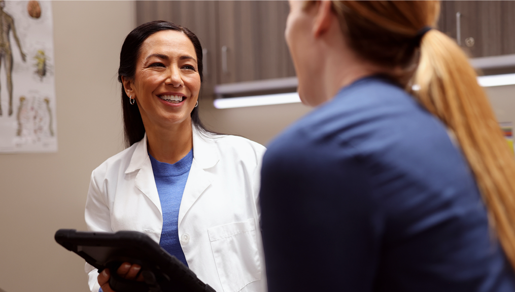 A provider talking with a patient