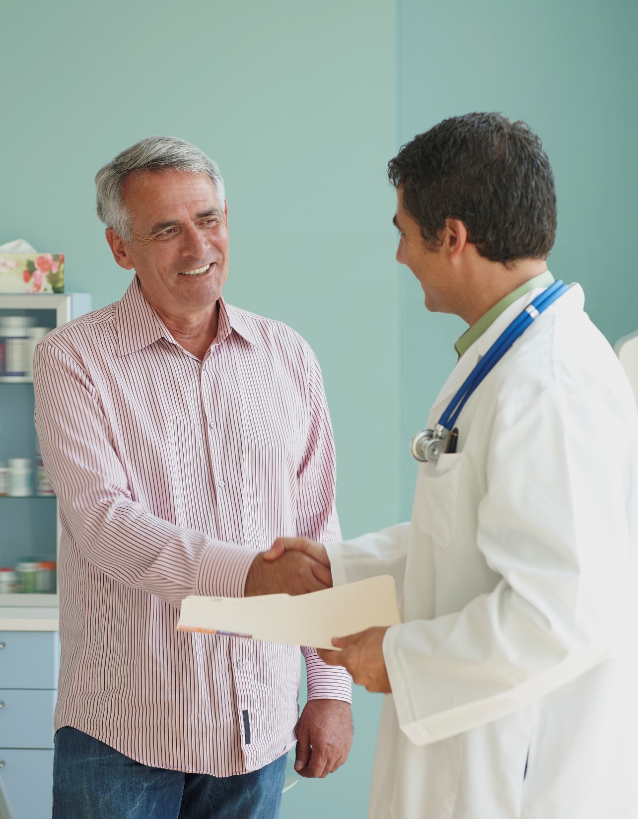 Doctor and patient shaking hands