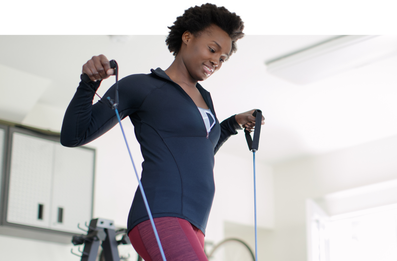 Woman exercising with resistance bands