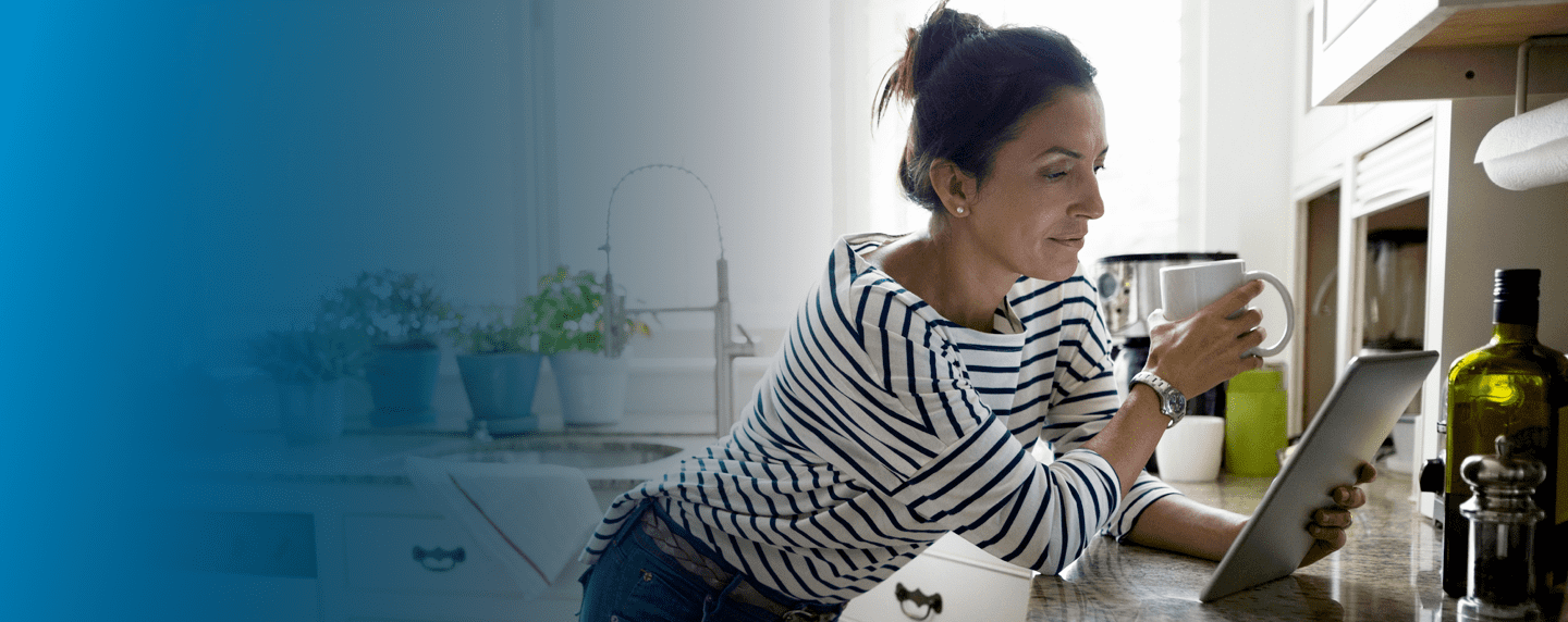 Woman managing her health insurance from a tablet