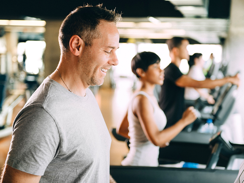 Man on treadmill in gym