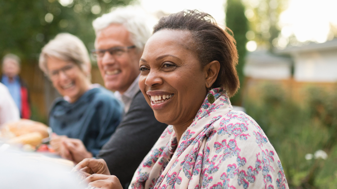 Man and woman smiling outside | BCBS of Tennessee
